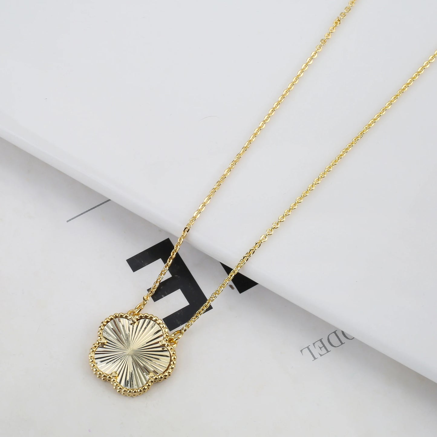 Luxury Five-Leaf Flower Jewelry Set – Double-Sided Shiny Metal Clover Design