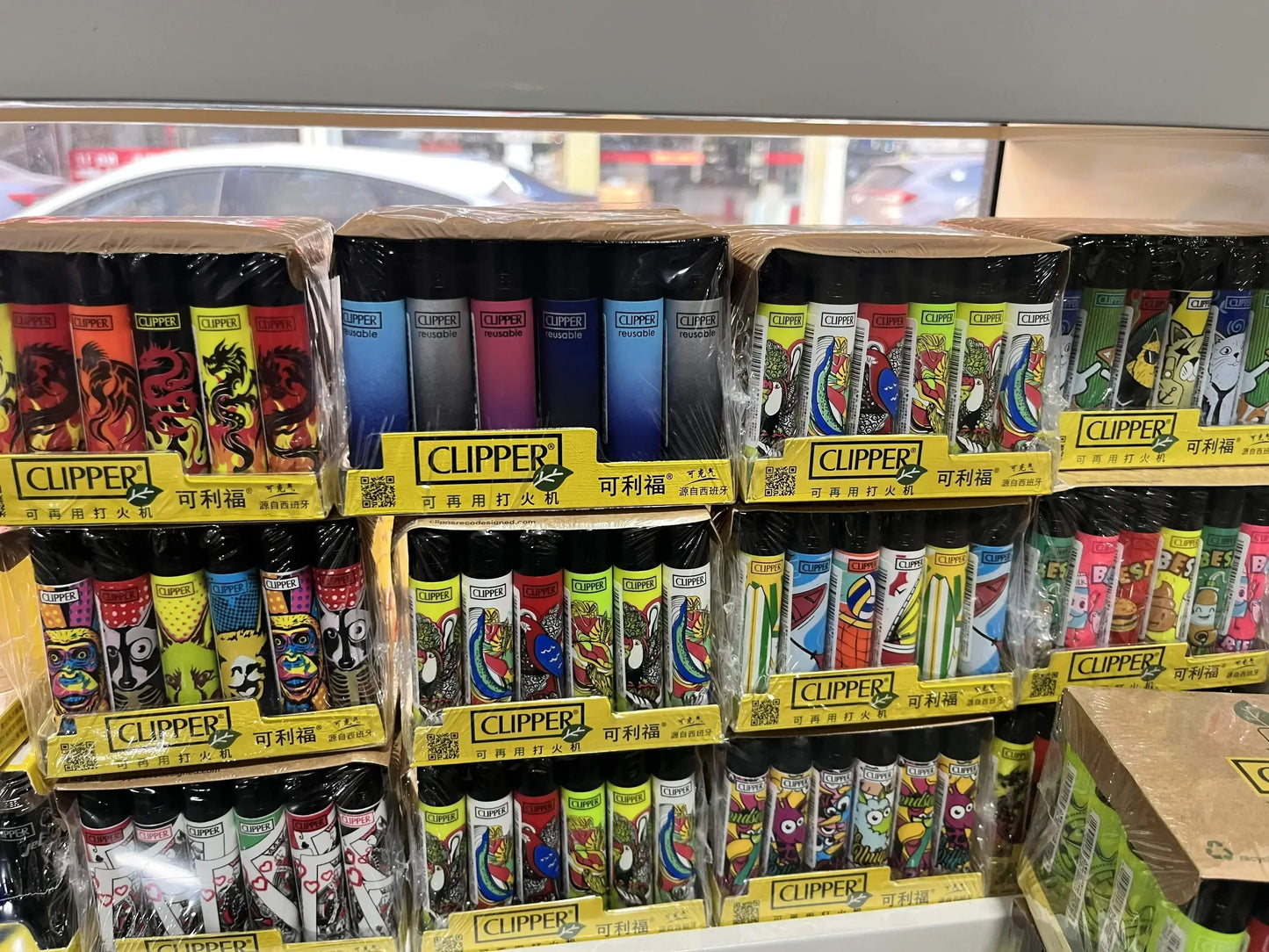 24-Piece Clipper-Style Butane Lighter Set – Refillable with Pattern Designs