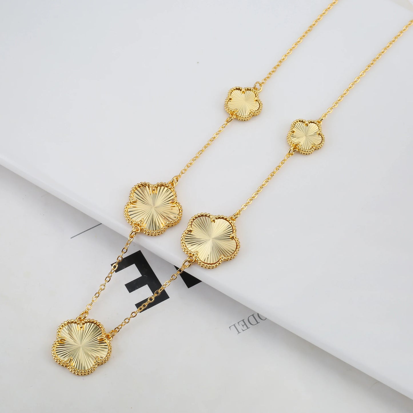 Luxury Five-Leaf Flower Jewelry Set – Double-Sided Shiny Metal Clover Design
