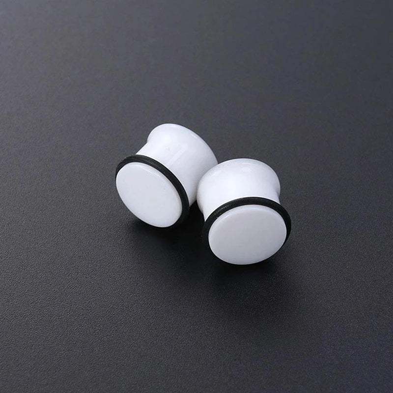 Glow-in-the-Dark Skull Ear Tunnels – Luminous Acrylic Gauges (2pcs)