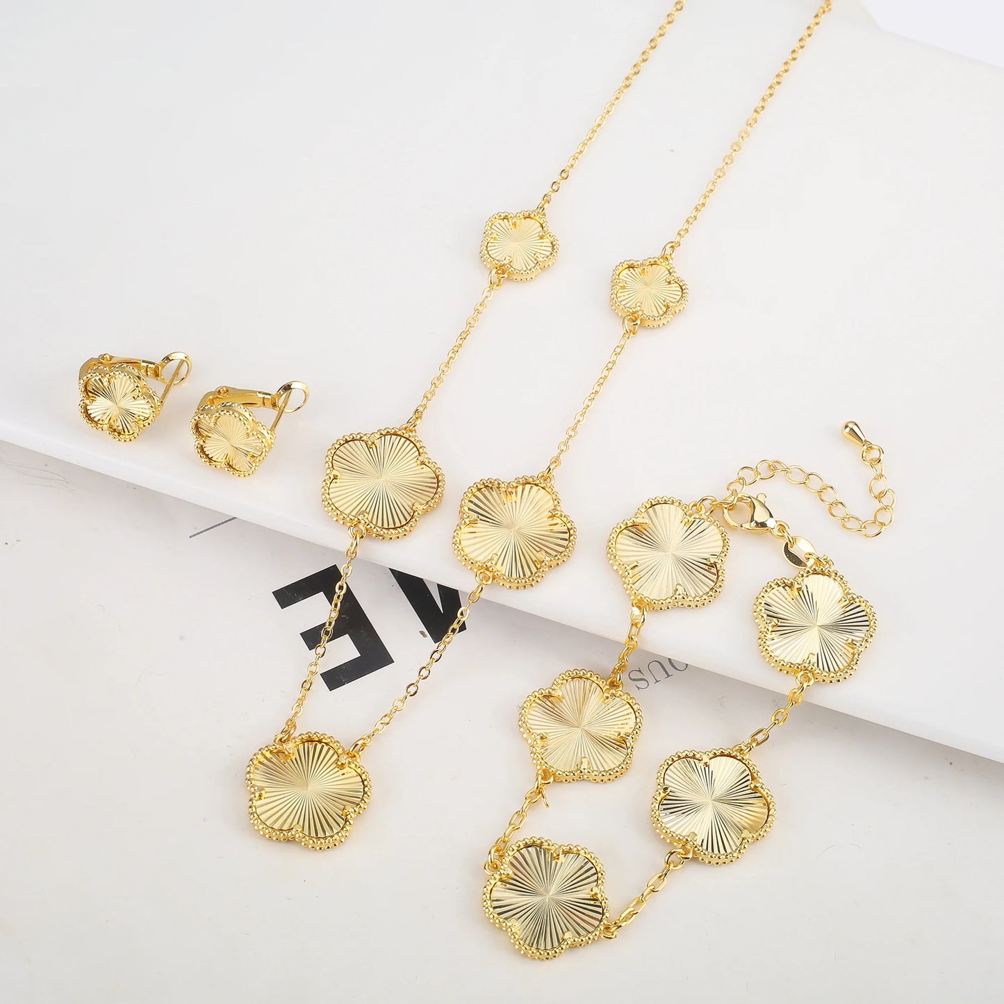 Luxury Double-Sided Five-Leaf Flower Jewelry Set – Gilded Clover Necklace, Bracelet & Earrings