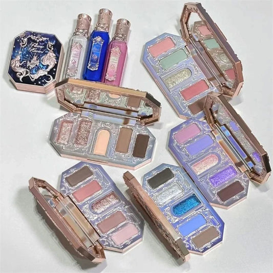 Collection of colorful makeup palettes on a light gray background