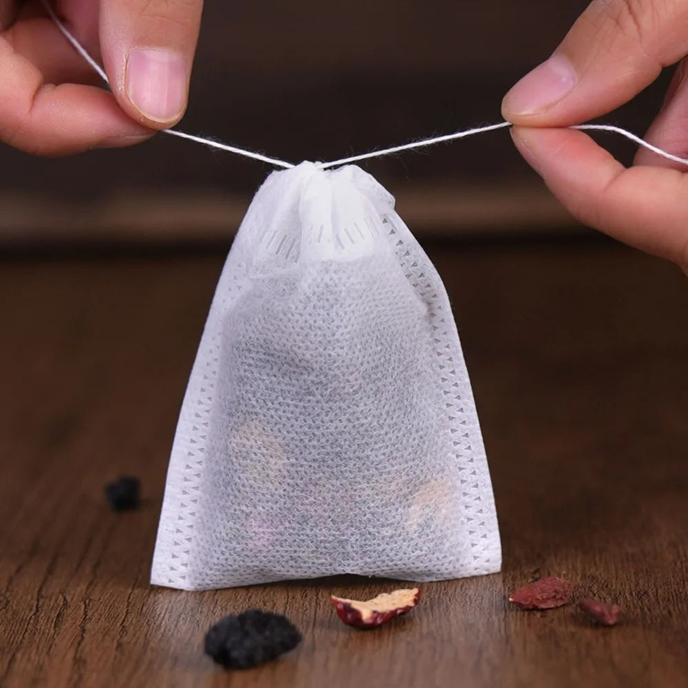 Disposable Tea Filter Bags – Empty Drawstring Paper Pouches for Loose Tea, Herbs & Coffee (100–1000PCS)