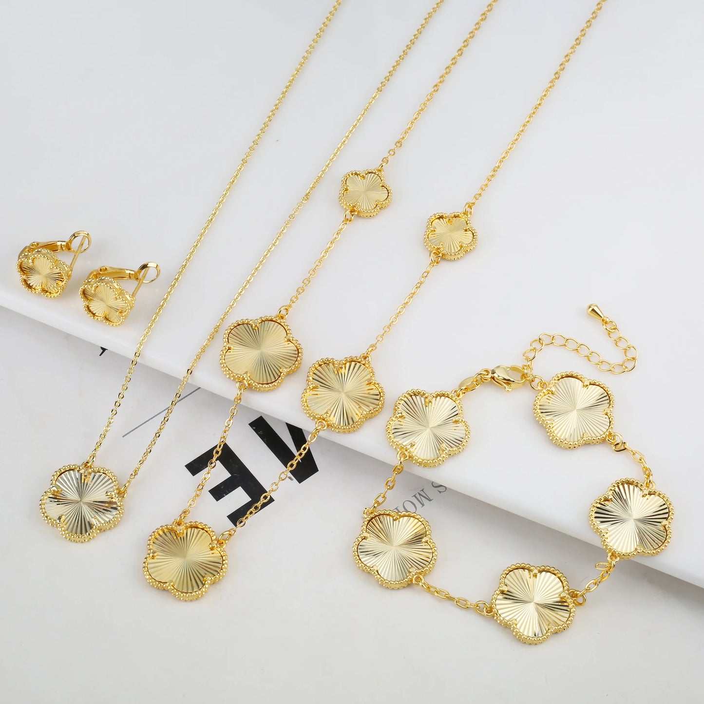 Luxury Double-Sided Five-Leaf Flower Jewelry Set – Gilded Clover Necklace, Bracelet & Earrings